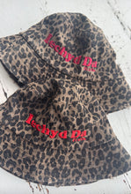 Load image into Gallery viewer, &quot;Iechyd Da&quot; leopard print bucket hats! Pre-order yours NOW to get the first delivery drop between 20th-22nd October!!!

