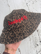 Load image into Gallery viewer, &quot;Iechyd Da&quot; leopard print bucket hats! Pre-order yours NOW to get the first delivery drop between 20th-22nd October!!!
