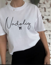 Load image into Gallery viewer, Nadolig "white oversized style T with black glitter"

