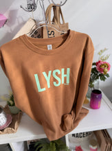 Load image into Gallery viewer, &quot;LYSH&quot; sweater Size M (10-12)
